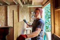 Carpenter working in shed